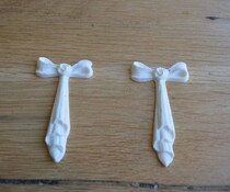 Strikjes, hangend per paar