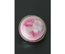 Roze button met vrouwen hoofd Roze button met vrouwen hoofd