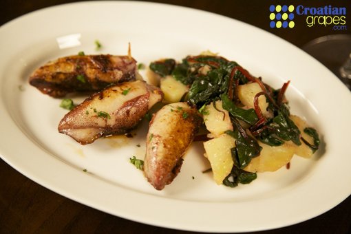 Squid stuffed with Prsut (smoked ham) and cheese