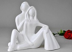 Dekorative Keramik & Kunststein Figuren