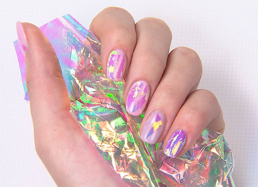 10. Light Pink Almond Nails with Holographic Finish - wide 2