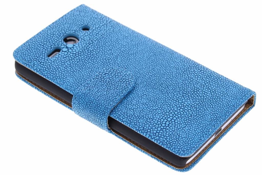 Image of Blauwe glanzend ribbelige booktype hoes voor de Huawei Ascend Y530