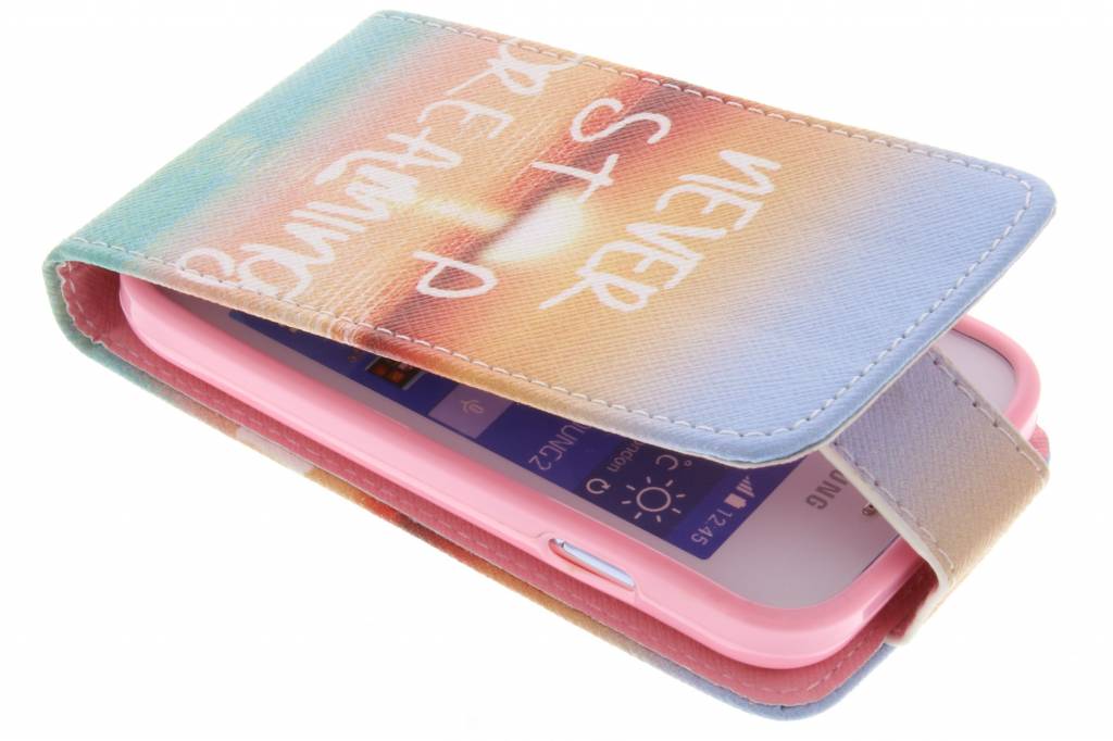 Image of Never stop dreaming design TPU flipcase voor de Samsung Galaxy Young 2