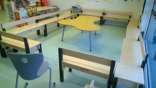 Wooden play furniture in a school classroom