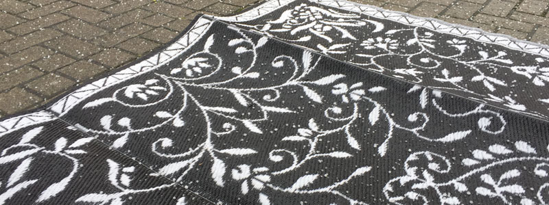 Hagel op een buiten vloerkleed