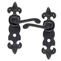 Gietijzeren kleine deurkruk op schild fleur-de-lis - vrij-bezet