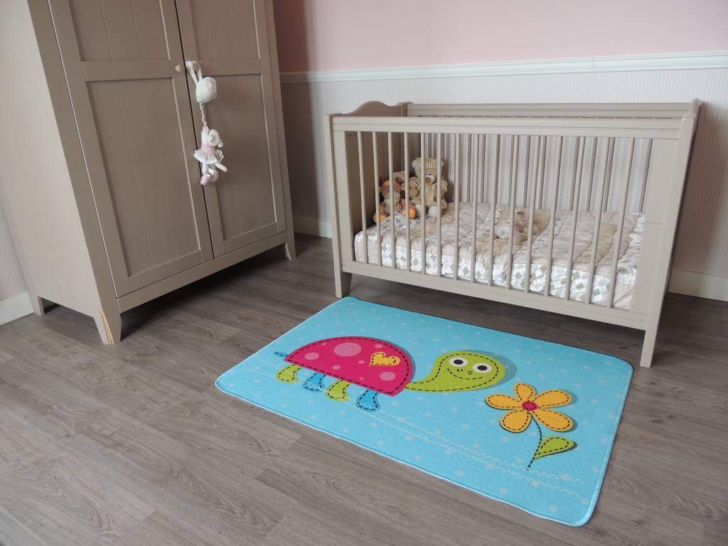 Een tapijt babykamer, zacht en mooi