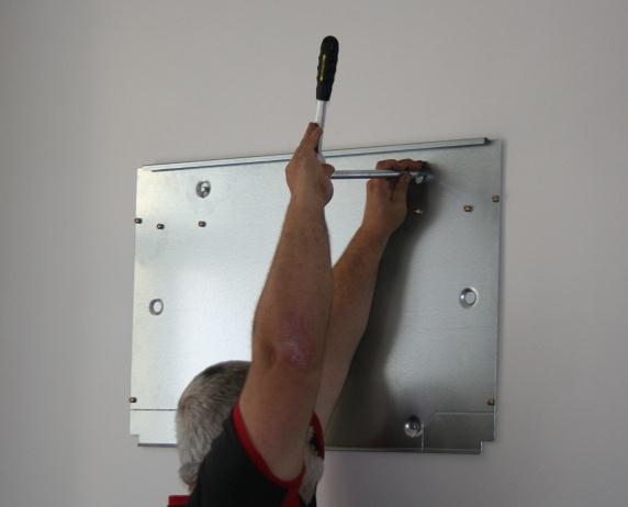 Mounting the supporting metal sheet on the wall