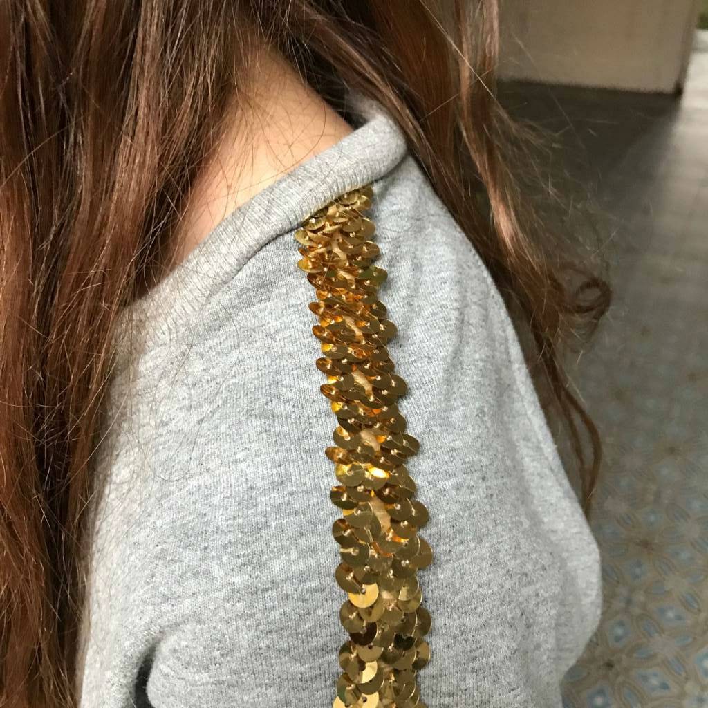 Hoe bevestig je paillettenband?