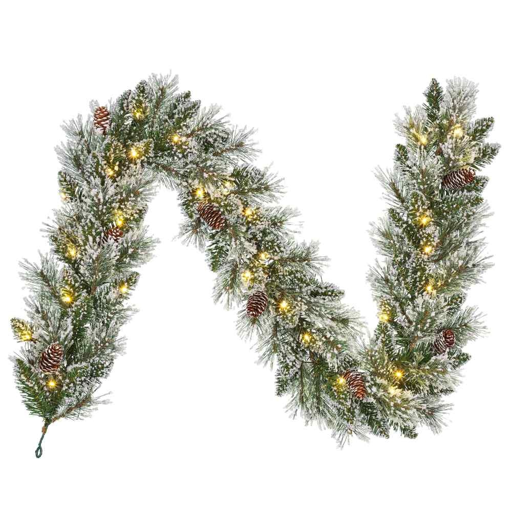 Kerstverserng: Gurlande met verlchtng langs de trap